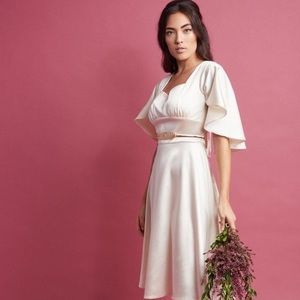 Voodoo Vixen satin dress in Ivory. Brand new.